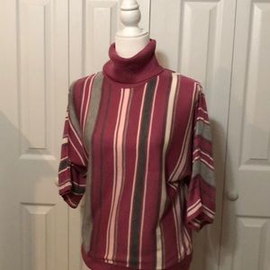 Turtleneck three quarter length sweater